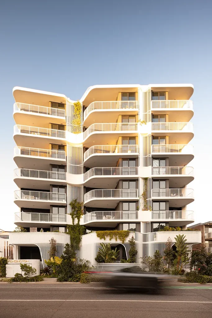 Newly completed apartment development photographed from street level.